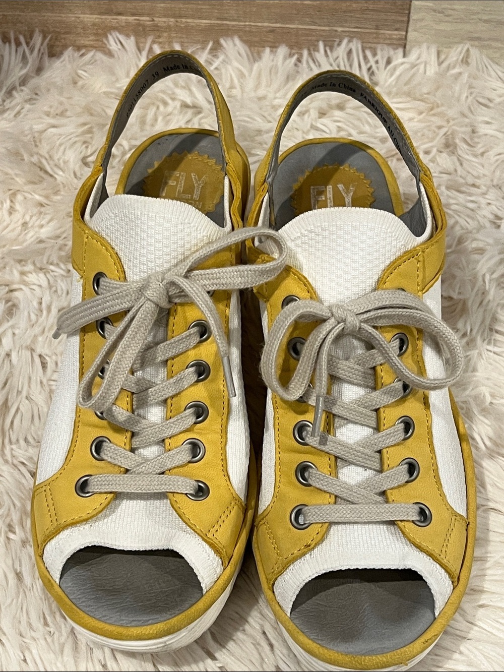 Fly London Yuta white and yellow lace up wedge shoes. Size 39, converts to 8.5.
